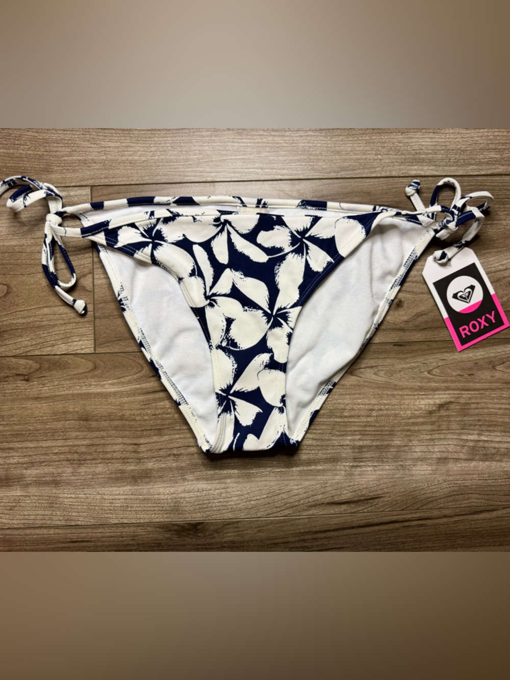 ROXY bikini bottoms blue white floral tie-side design Women’s size medium NEW